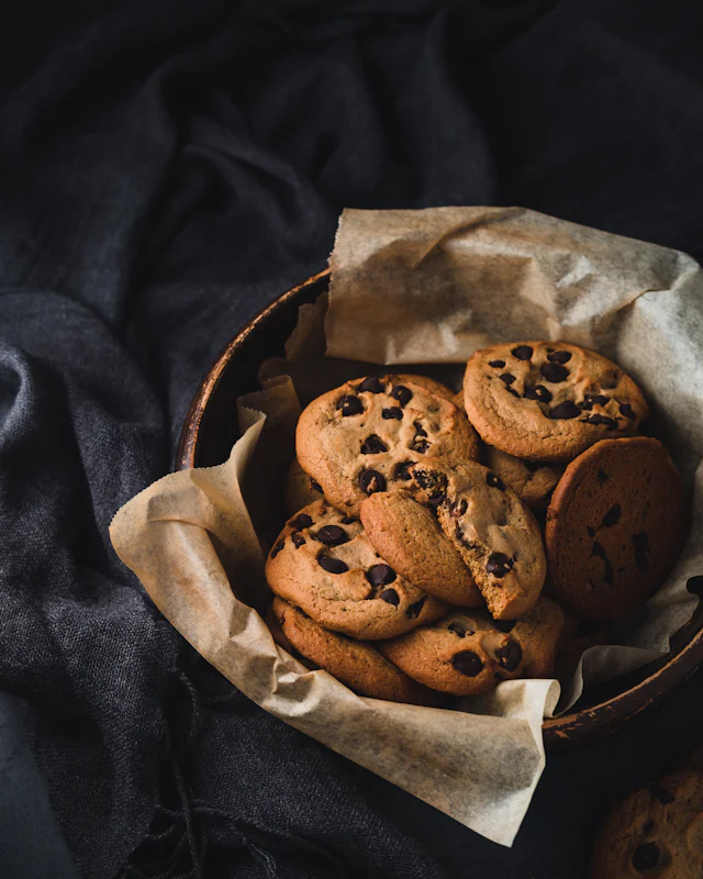 Chocolate chip cookies in a paper-lined basket